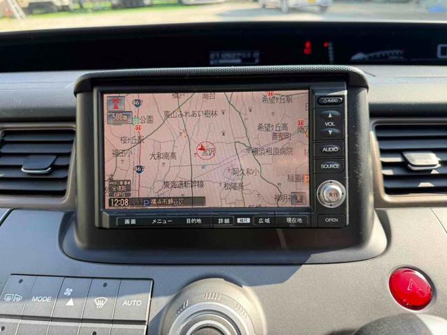 ステップワゴン Ｇ　Ｌ　ＨＤＤナビパッケージ　ＥＴＣ　バックカメラ　ナビ　両側スライド・片側電動　ＨＩＤ　キーレスエントリー　３列シート　ウォークスルー　ＡＴ　盗難防止システム　衝突安全ボディ　ＡＢＳ　エアコン　パワーステアリング（5枚目）