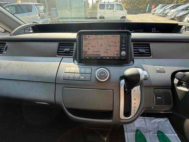 ステップワゴン Ｇ　Ｌ　ＨＤＤナビパッケージ　ＥＴＣ　バックカメラ　ナビ　両側スライド・片側電動　ＨＩＤ　キーレスエントリー　３列シート　ウォークスルー　ＡＴ　盗難防止システム　衝突安全ボディ　ＡＢＳ　エアコン　パワーステアリング（9枚目）