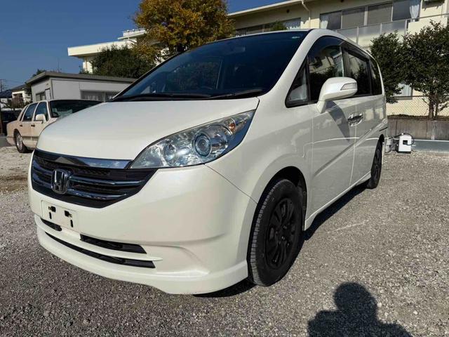 ステップワゴン Ｇ　Ｌ　ＨＤＤナビパッケージ　ＥＴＣ　バックカメラ　ナビ　両側スライド・片側電動　ＨＩＤ　キーレスエントリー　３列シート　ウォークスルー　ＡＴ　盗難防止システム　衝突安全ボディ　ＡＢＳ　エアコン　パワーステアリング（13枚目）