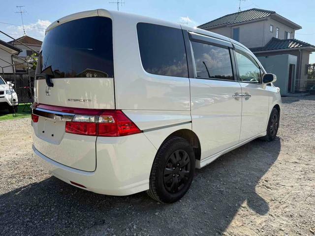 ステップワゴン Ｇ　Ｌ　ＨＤＤナビパッケージ　ＥＴＣ　バックカメラ　ナビ　両側スライド・片側電動　ＨＩＤ　キーレスエントリー　３列シート　ウォークスルー　ＡＴ　盗難防止システム　衝突安全ボディ　ＡＢＳ　エアコン　パワーステアリング（15枚目）