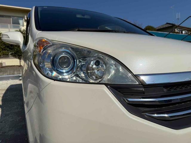 ステップワゴン Ｇ　Ｌ　ＨＤＤナビパッケージ　ＥＴＣ　バックカメラ　ナビ　両側スライド・片側電動　ＨＩＤ　キーレスエントリー　３列シート　ウォークスルー　ＡＴ　盗難防止システム　衝突安全ボディ　ＡＢＳ　エアコン　パワーステアリング（21枚目）