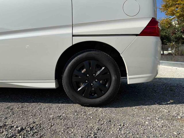 ステップワゴン Ｇ　Ｌ　ＨＤＤナビパッケージ　ＥＴＣ　バックカメラ　ナビ　両側スライド・片側電動　ＨＩＤ　キーレスエントリー　３列シート　ウォークスルー　ＡＴ　盗難防止システム　衝突安全ボディ　ＡＢＳ　エアコン　パワーステアリング（24枚目）