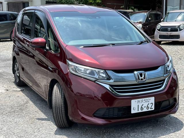 フリードハイブリッド ハイブリッド・Ｇホンダセンシング　全国対応１年保証付き　ＥＴＣ　バックカメラ　ナビ　ＴＶ　レーンアシスト　衝突被害軽減システム　両側電動スライドドア　オートライト　ＬＥＤヘッドランプ　スマートキー　後席モニター　３列シート　ＡＴ（13枚目）