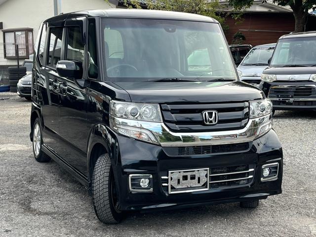 Ｎ－ＢＯＸカスタム Ｇ　ＳＳブラックスタイルパッケージ　４ＷＤ　ＥＴＣ　バックカメラ　両側電動スライドドア　ナビ　ＴＶ　衝突被害軽減システム　オートライト　ＨＩＤ　スマートキー　アイドリングストップ　電動格納ミラー　シートヒーター　ベンチシート　ＣＶＴ（14枚目）