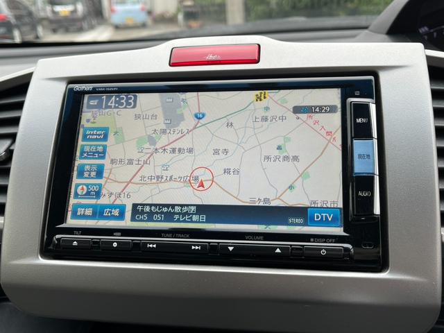 フリードハイブリッド ジャストセレクション　ＥＴＣ　バックカメラ　ナビ　ＴＶ　オートクルーズコントロール　両側電動スライドドア　オートライト　ＨＩＤ　スマートキー　アイドリングストップ　電動格納ミラー　後席モニター（4枚目）