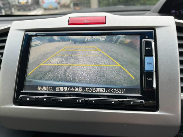 フリードハイブリッド ジャストセレクション　ＥＴＣ　バックカメラ　ナビ　ＴＶ　オートクルーズコントロール　両側電動スライドドア　オートライト　ＨＩＤ　スマートキー　アイドリングストップ　電動格納ミラー　後席モニター（6枚目）