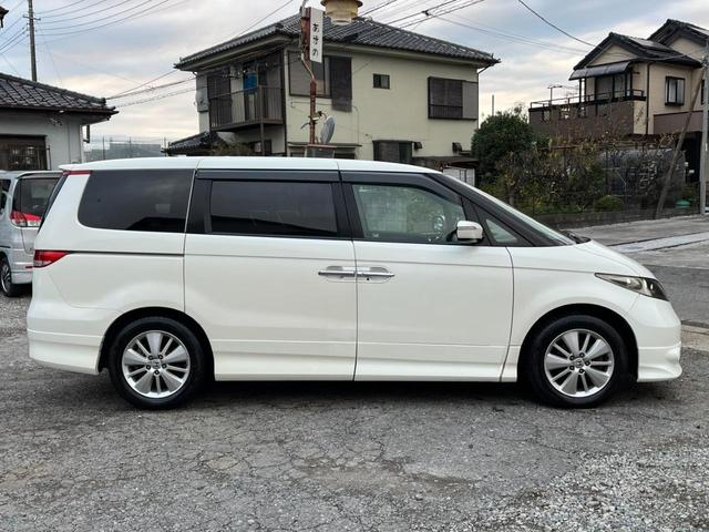 エリシオン GエアロHDDナビスペシャルパッケージ バックカメラ ナビ 両側電動スライドドア オートライト HID キーレスエントリー 3列シート AT アルミホイール 盗難防止システム 衝突安全ボディ ABS エアコン パワーステアリング(15枚目)