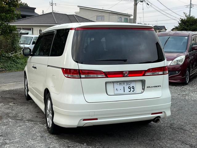 エリシオン GエアロHDDナビスペシャルパッケージ バックカメラ ナビ 両側電動スライドドア オートライト HID キーレスエントリー 3列シート AT アルミホイール 盗難防止システム 衝突安全ボディ ABS エアコン パワーステアリング(19枚目)