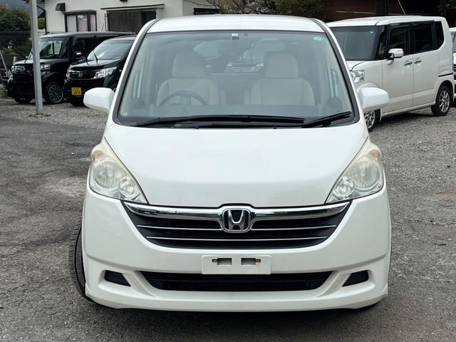 ステップワゴン G 4WD バックカメラ ナビ 両側スライド・片側電動 キーレスエントリー 3列シート AT 盗難防止システム 衝突安全ボディ ABS エアコン パワーステアリング(13枚目)