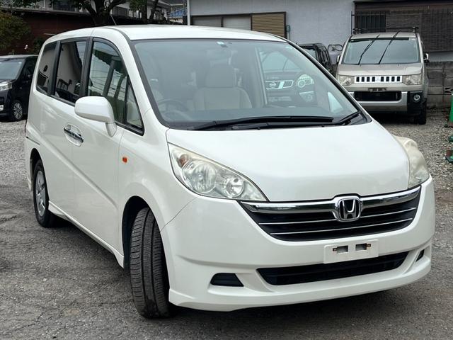 ステップワゴン G 4WD バックカメラ ナビ 両側スライド・片側電動 キーレスエントリー 3列シート AT 盗難防止システム 衝突安全ボディ ABS エアコン パワーステアリング(14枚目)