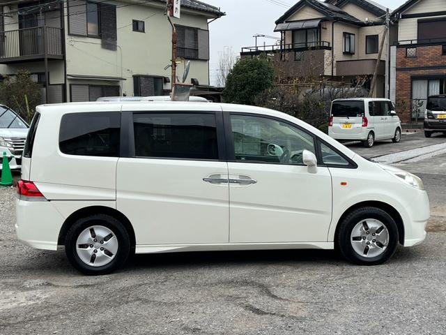 ステップワゴン G 4WD バックカメラ ナビ 両側スライド・片側電動 キーレスエントリー 3列シート AT 盗難防止システム 衝突安全ボディ ABS エアコン パワーステアリング(15枚目)