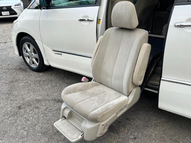 エスティマハイブリッド G 4WD 福祉車輌 ナビ TV オートクルーズコントロール 両側電動スライドドア オートライト HID スマートキー 電動格納ミラー 後席モニター 3列シート(3枚目)