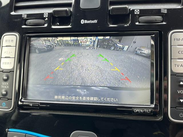 リーフ X バックカメラ オートクルーズコントロール アルミホイール オートライト スマートキー CVT 盗難防止システム 衝突安全ボディ ABS ESC エアコン パワーステアリング(2枚目)