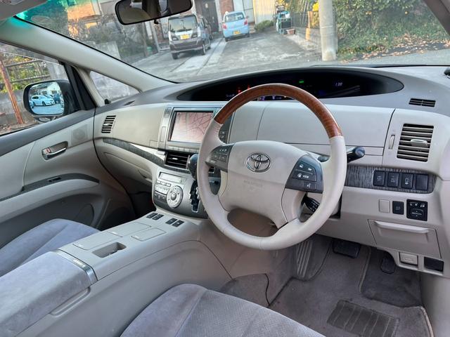 エスティマハイブリッド Ｇ　４ＷＤ　バックカメラ　フロントカメラ　ナビ　ＴＶ　オートクルーズコントロール　両側電動スライドドア　オートライト　ＨＩＤ　スマートキー　電動格納ミラー　シートヒーター　３列シート（2枚目）