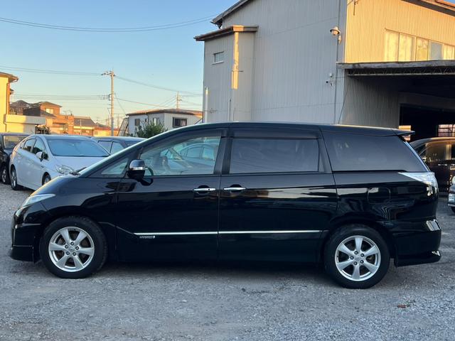 エスティマハイブリッド Ｇ　４ＷＤ　バックカメラ　フロントカメラ　ナビ　ＴＶ　オートクルーズコントロール　両側電動スライドドア　オートライト　ＨＩＤ　スマートキー　電動格納ミラー　シートヒーター　３列シート（15枚目）