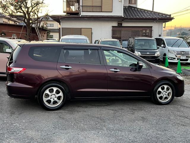 オデッセイ Ｍファインスピリット　オートライト　ＨＩＤ　キーレスエントリー　３列シート　ＣＶＴ　アルミホイール　ＣＤ　ＵＳＢ　ミュージックプレイヤー接続可　盗難防止システム　衝突安全ボディ　ＡＢＳ　エアコン　パワーステアリング（13枚目）