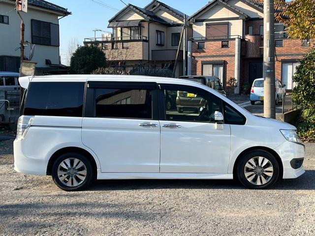 ステップワゴンスパーダ Z ETC バックカメラ ナビ TV 両側電動スライドドア オートライト HID スマートキー アイドリングストップ 後席モニター 3列シート ウォークスルー CVT アルミホイール CD(14枚目)