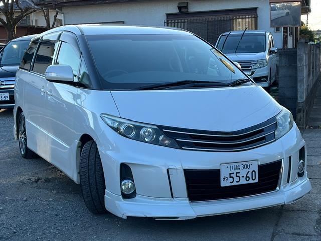 エスティマ アエラス バックカメラ ナビ TV オートクルーズコントロール 両側電動スライドドア オートライト HID スマートキー 電動格納ミラー 後席モニター 3列シート CVT アルミホイール CD DVD再生(13枚目)