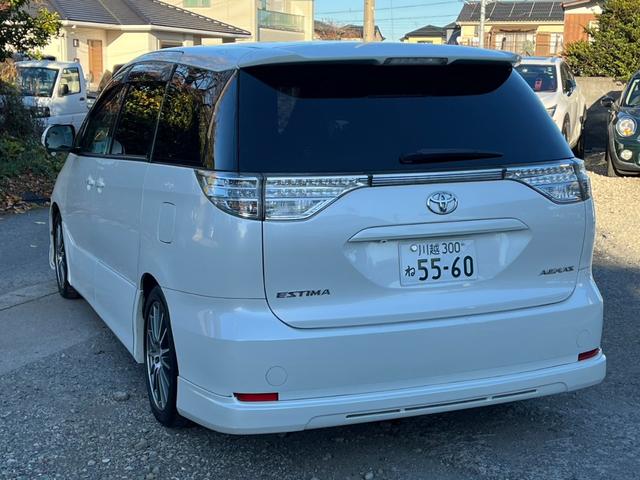 エスティマ アエラス バックカメラ ナビ TV オートクルーズコントロール 両側電動スライドドア オートライト HID スマートキー 電動格納ミラー 後席モニター 3列シート CVT アルミホイール CD DVD再生(18枚目)