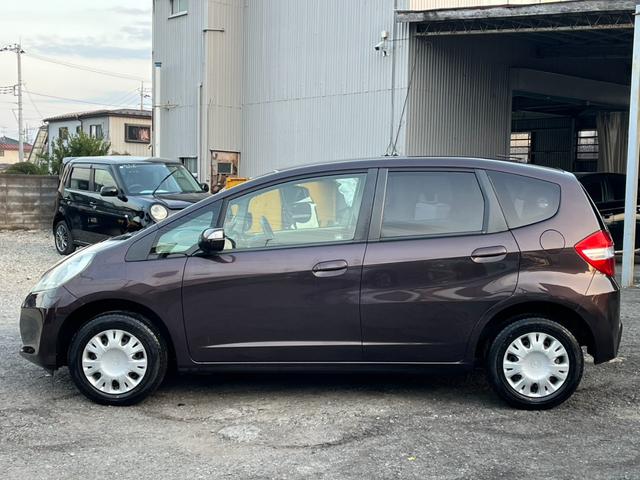 フィット 13G・スマートセレクション スマートキー CVT 盗難防止システム 衝突安全ボディ ABS CD ミュージックプレイヤー接続可 エアコン パワーステアリング パワーウィンドウ(18枚目)