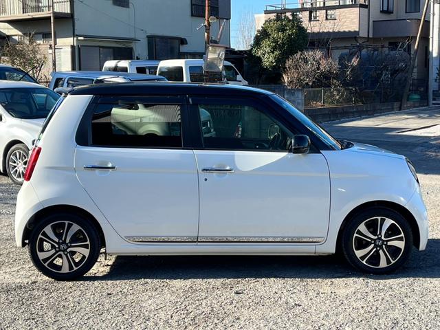 Ｎ－ＯＮＥ プレミアム　ツアラー　バックカメラ　ナビ　ＴＶ　衝突被害軽減システム　オートライト　ＨＩＤ　アイドリングストップ　ベンチシート　ＣＶＴ　盗難防止システム　ＡＢＳ　ＥＳＣ　ＣＤ　ＵＳＢ　ミュージックプレイヤー接続可（14枚目）