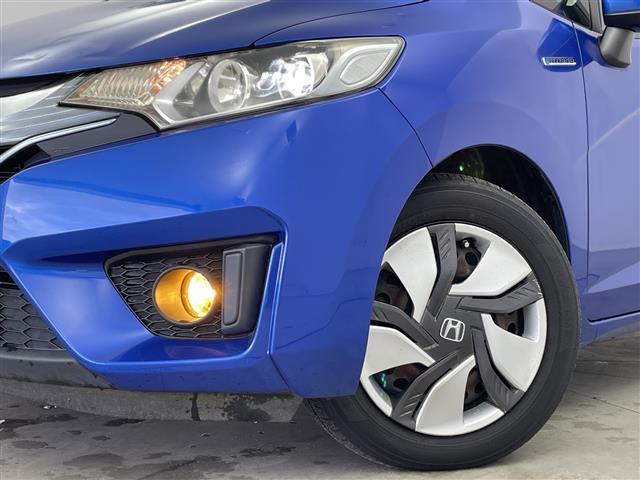 フィットハイブリッド Lパッケージ 純正ナビTV(CD/DVD/Bluetooth/フルセグTV/AM/FM/HDMI) 純正バックカメラ 社外ドライブレコーダー(VREC-DZ300)純正LEDオートライト 純正フロアマット(24枚目)