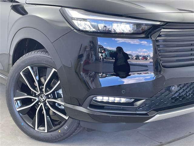 ヴェゼル ｅ：ＨＥＶ　Ｚ　ホンダセンシング☆ブラインドスポットインフォメーション☆レザーステアリング☆パドルシフト☆アダプティグドライビングビーム☆後退出庫サポート☆ステアリングヒーター☆置くだけ充電（15枚目）