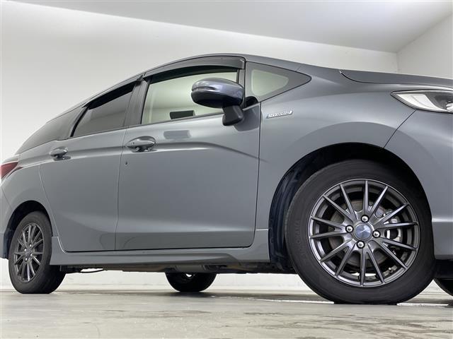 シャトル ハイブリッド　ホンダセンシング　ホンダセンシング／衝突軽減ブレーキ／レーダークルーズコントロール／レーンキープアシスト／純正ディーラーＯＰナビ／バックカメラ／ビルトインＥＴＣ／プッシュスタート／社外１５インチアルミホイール（14枚目）