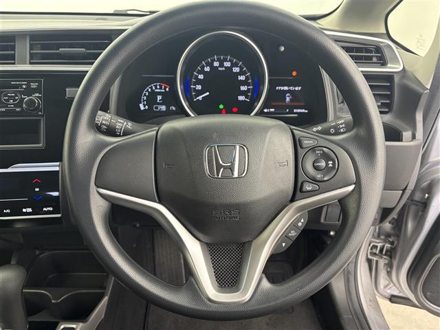 フィット １３Ｇ・Ｆ　１オーナー　純正オーディオ（ＣＤ）　ホンダセンシング　ＡＣＣ　ＣＭＢＳ（衝突軽減ブレーキ）　レーンキープアシスト　先行車発進お知らせ　スマートキー　プッシュスタート　横滑防止装置　純正マット　スペア（7枚目）