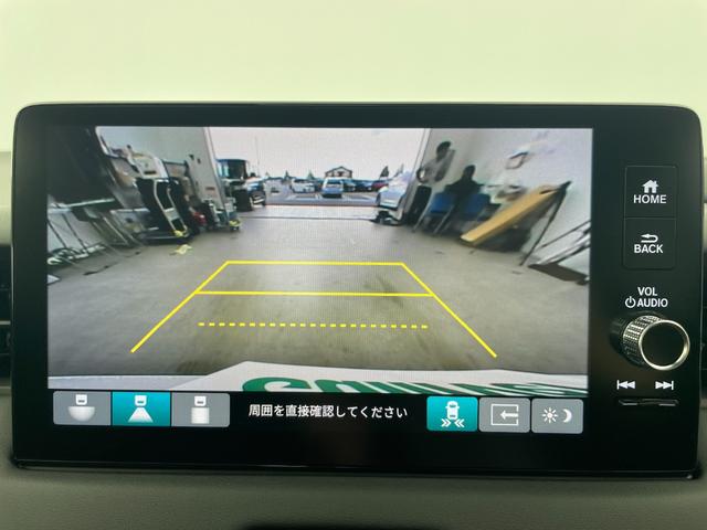 ヴェゼル ｅ：ＨＥＶ　Ｚ　登録済未使用車　純正ナビ　バックカメラ　ＥＴＣ　ハーフレザーシート　シートヒーター　ハンドルヒーター　衝突被害軽減システム　レーダークルーズコントロール　コーナーセンサー　ブラインドスポットモニター（6枚目）