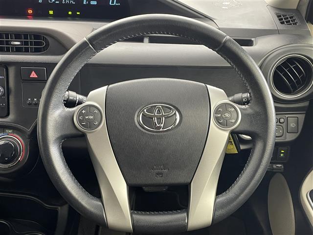 アクア G 純正ナビ バックカメラ 衝突軽減ブレーキ ETC シートヒーター 社外アルミホイール 純正フロアマット スマートキー ステアリングスイッチ プッシュスタート スマートキー オートライト 地デジフルセグ(6枚目)