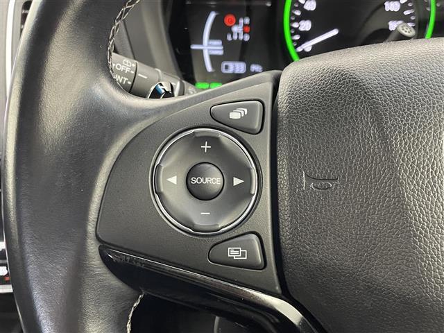 ヴェゼル ハイブリッドＺ・ホンダセンシング　社外８インチナビ　バックカメラ　ビルトインＥＴＣ　ドライブレコーダー　ホンダセンシング　アダプティブクルーズコントロール　シートヒーター　メモリシート　ＨＤＭＩ　純正アルミ　オートライト　ＬＥＤ　ＴＶ（13枚目）