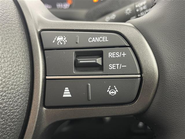 フリード ｅ：ＨＥＶエアー　ＥＸ　登録済未使用車　純正９インチナビ　Ｂカメラ　ＢＳＭ　ホンダセンシング　アダクティブクルーズコントロール　シートヒーター　純正アルミホイール　オートハイビーム　ＬＥＤヘッドライト　地デジＴＶ（10枚目）