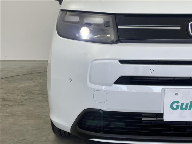 フリード ｅ：ＨＥＶエアー　ＥＸ　登録済未使用車　純正９インチナビ　Ｂカメラ　ＢＳＭ　ホンダセンシング　アダクティブクルーズコントロール　シートヒーター　純正アルミホイール　オートハイビーム　ＬＥＤヘッドライト　地デジＴＶ（32枚目）