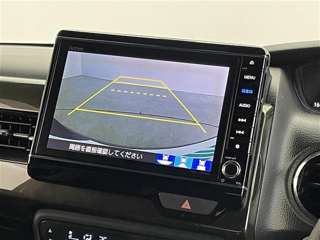 N-BOXカスタム G・EXホンダセンシング 純正8インチナビ バックカメラ ビルトインETC 前後ドライブレコーダー ホンダセンシング アダプティブクルーズコントロール 純正アルミホイール オートハイビーム LEDヘッドライト 地デジフルセグ(3枚目)