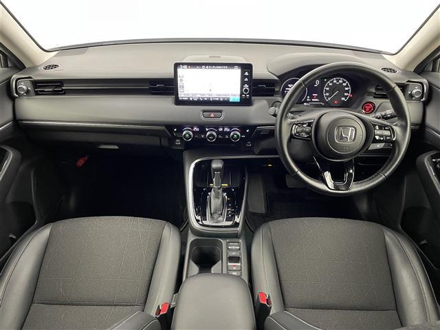 ヴェゼル ｅ：ＨＥＶ　Ｚ　純正９インチディスプレイオーディオ　バックカメラ　ＢＳＭ　ビルトインＥＴＣ２．０　ドライブレコーダー　アダプティブクルーズ　ステアリングヒーター　シートヒーター　ワイヤレス充電　オートハイビーム　ＴＶ（2枚目）