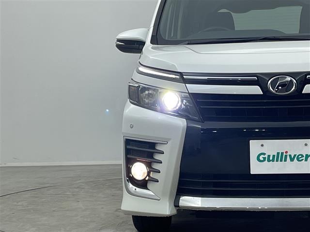 ヴォクシー ＺＳ　純正９インチ　フリップダウンモニター　バックカメラ　ビルトインＥＴＣ　両側パワースライドドア　コーナーセンサー　純正アルミホイール　プッシュスタート　スマートキー　オートライト　ＬＥＤライト　ＴＶ（34枚目）