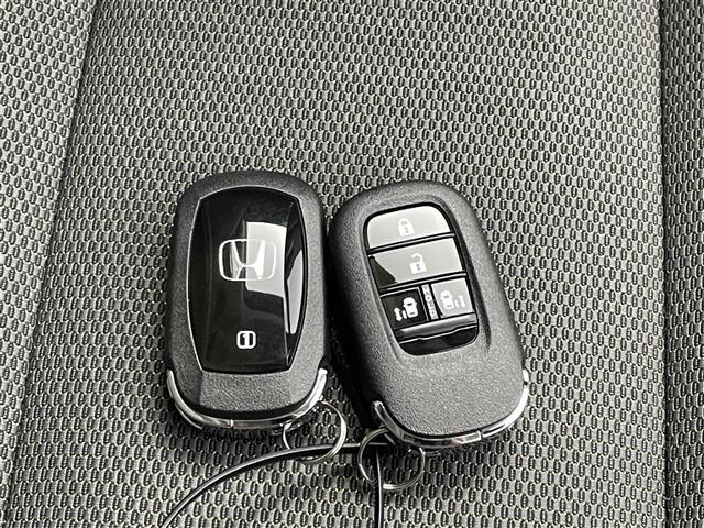 フリード e:HEVクロスター 登録済未使用車 純正9型ナビ 地デジ Bカメラ ホンダセンシング 衝突軽減 レーンキープ レーダークルコン BSM クリアランスソナー 両側電動スライド シートヒーター LEDオートライト 純正AW(19枚目)