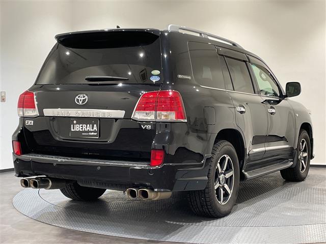 ランドクルーザー ZX 60thブラックレザーセレクション アイドリングストップ.ETC.サンルーフ.ABS.クルーズコントロール.フリップダウンモニター.バックカメラ.フルセグTV.3列シート.電動リアゲート.チップアップシート.ルーフレール.純正フロア(3枚目)