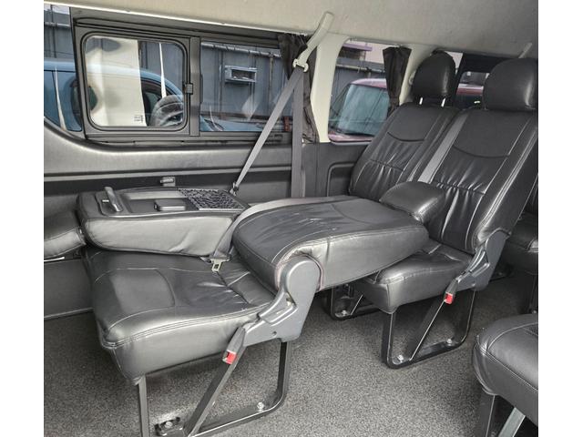 ハイエースコミューター スーパーロングＧＬ　３ナンバー１０人乗り構造変更　スマートキ　ＬＥＤヘッドライト　衝突被害軽減システム　バックカメラ　パワースライドドア　ＥＴＣ　全席フルフラット　前後ドライブレコーダー　Ｂｌｕｅｔｏｏｔｈ　車載用冷蔵庫（12枚目）