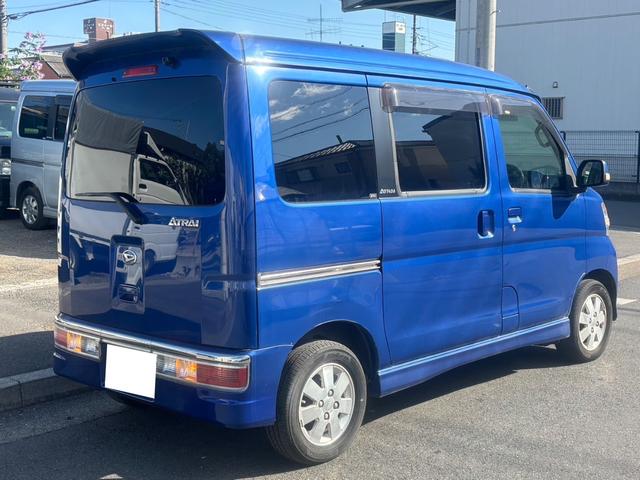 アトレーワゴン カスタムターボＲＳリミテッド　車検令和９年１１月・純正ナビ＆フルセグＴＶ＆バックカメラ付き・キーレスエントリー・ターボ・フロントフォグ・サイドバイザー・電動格納ウインカーミラー・純正ＡＷ・リアスポイラー・左側パワースライドドア（4枚目）