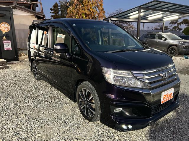 ステップワゴンスパーダ Ｚ　クールスピリット　無限エアロ　純正９型ＳＤナビ　Ｂｌｕｅｔｏｏｔｈ　ＴＶ　走行中視聴　フリップダウンモニター　前後ドライブレコーダー　バックカメラ　純正アルミ　スマートキー　スペアキー　３列目格納　８人乗り（50枚目）