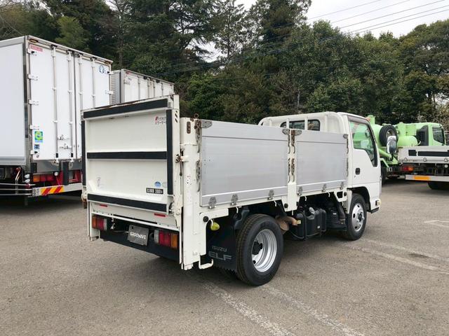 エルフトラック アルミブロック　１０尺　３ｔ４ナンバー　垂直ゲート　積載３ｔ　Ｆ６　６速　マニュアル　アルミアオリ　アルミ平　アルミＢ　平ボデイー　平ボデー　パワーゲート　ゲート付　記録簿有（4枚目）