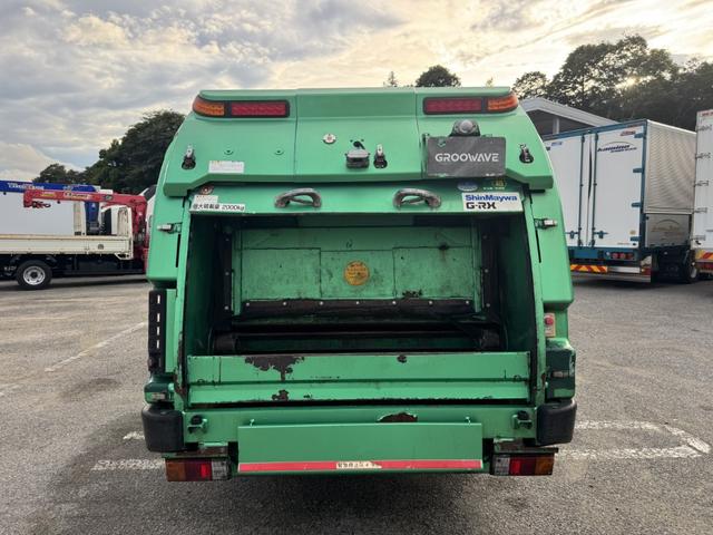 キャンター 巻込みパッカー　新明和　ＧＲ０５２－１４３４　５．１立米　連続スイッチ　汚水タンク　積載２ｔ　Ｉ５　５速　マニュアル　塵芥車　パッカー車　ゴミ収集車　巻き込み式　ドラレコ（11枚目）