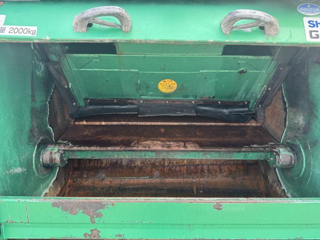 キャンター 巻込みパッカー　新明和　ＧＲ０５２－１４３４　５．１立米　連続スイッチ　汚水タンク　積載２ｔ　Ｉ５　５速　マニュアル　塵芥車　パッカー車　ゴミ収集車　巻き込み式　ドラレコ（12枚目）