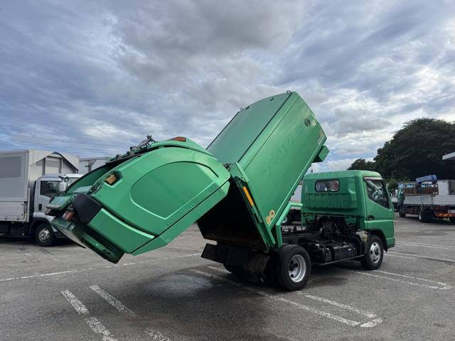 キャンター 巻込みパッカー　新明和　ＧＲ０５２－１４３４　５．１立米　連続スイッチ　汚水タンク　積載２ｔ　Ｉ５　５速　マニュアル　塵芥車　パッカー車　ゴミ収集車　巻き込み式　ドラレコ（21枚目）