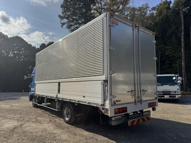 ヒノレンジャー アルミウイング ワイド ベッド付 ハイルーフ 6,270×2,400×2,420 トランテックス リア観音扉 ラッシング2段 引出しフック5対 積載3.05t F6 6速 マニュアル 4t ウイング バックカメラ アイドリングストップ(4枚目)