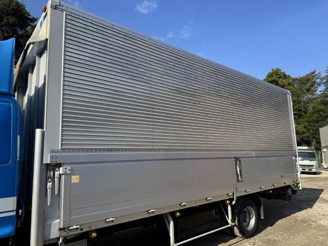 ヒノレンジャー アルミウイング ワイド ベッド付 ハイルーフ 6,270×2,400×2,420 トランテックス リア観音扉 ラッシング2段 引出しフック5対 積載3.05t F6 6速 マニュアル 4t ウイング バックカメラ アイドリングストップ(7枚目)