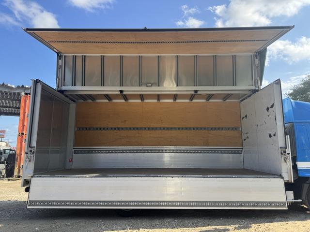 ヒノレンジャー アルミウイング ワイド ベッド付 ハイルーフ 6,270×2,400×2,420 トランテックス リア観音扉 ラッシング2段 引出しフック5対 積載3.05t F6 6速 マニュアル 4t ウイング バックカメラ アイドリングストップ(16枚目)