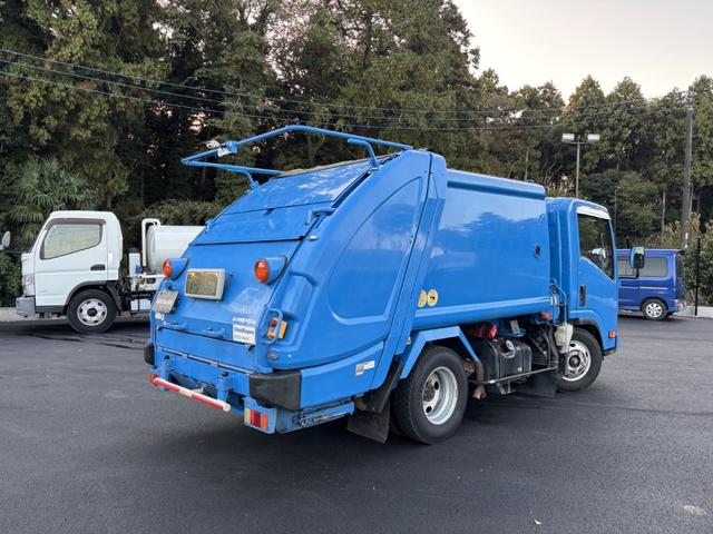 エルフトラック プレスパッカー 新明和 GTO42-5433WS1 4.2立米 汚水タンク 低騒音 助手席側スライドドア 積載2t F6 6速 マニュアル 塵芥車 プレス式 ゴミ収集車 2tパッカー ETC1.0 バックカメラ(4枚目)